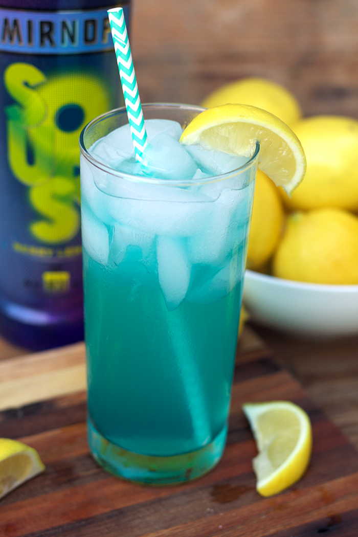 Sharing a fun cocktail with you to celebrate #NationalVodkaDay with this Electric Lemonade featuring Smirnoff Sours Lemon Berry
