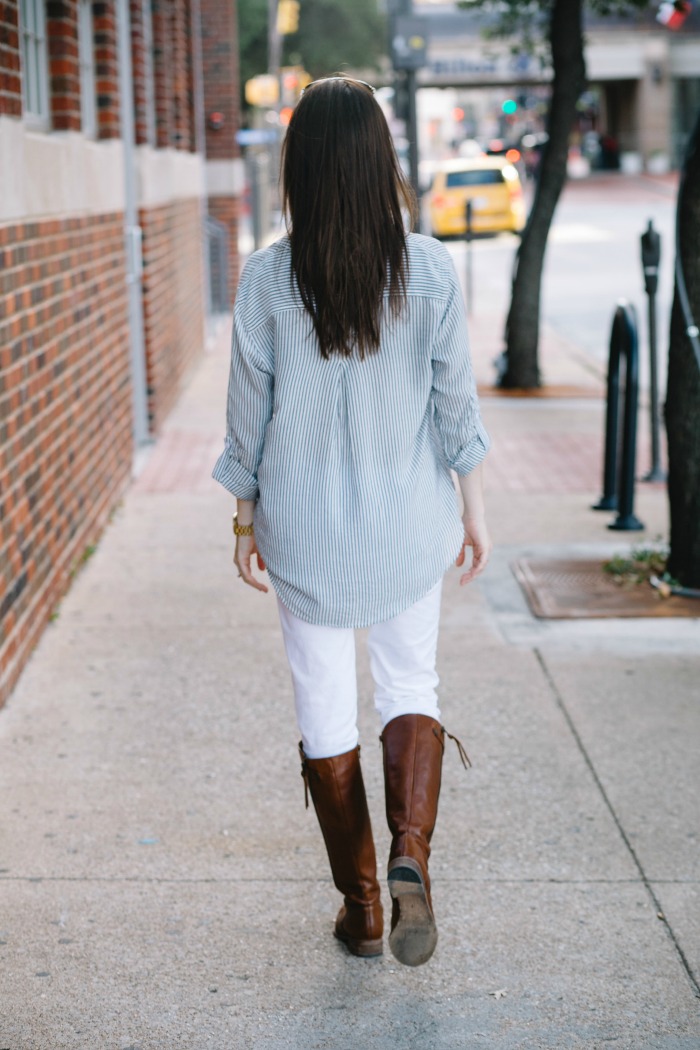 How to Style White Jeans for Fall with a pair of Riding Boots and Striped Boyfriend Shirt